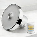 founté filtered showerhead with replacement filter cartridge on marble surface