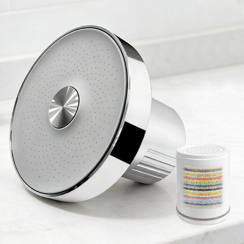 founté filtered showerhead with replacement filter cartridge on marble surface